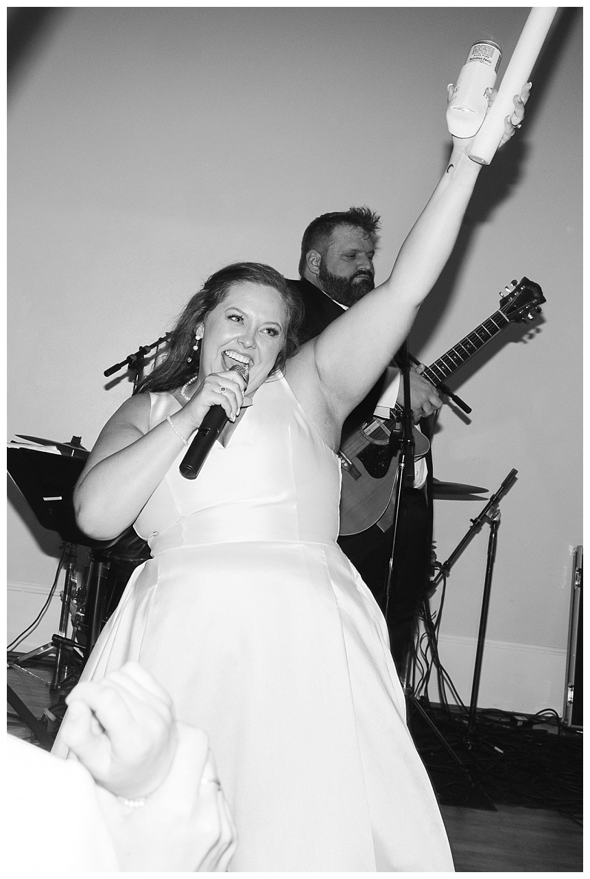 bride sings at her reception