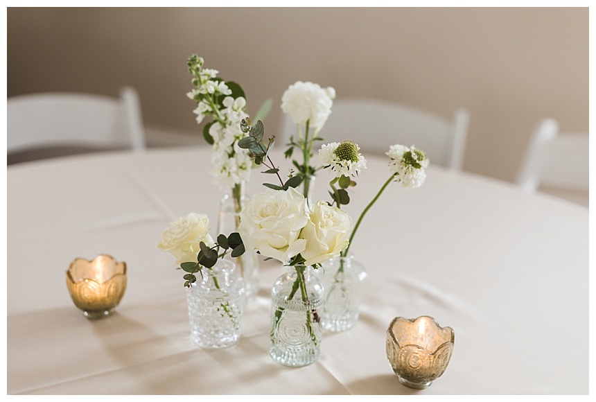 wildflowers in glass bottles